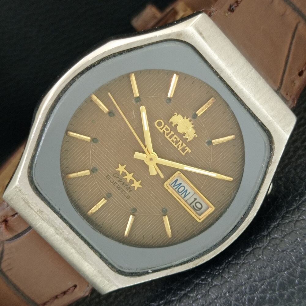 Vintage 1981 Orient Automatic Mens Silver Watch W/daydate & Gold accents
